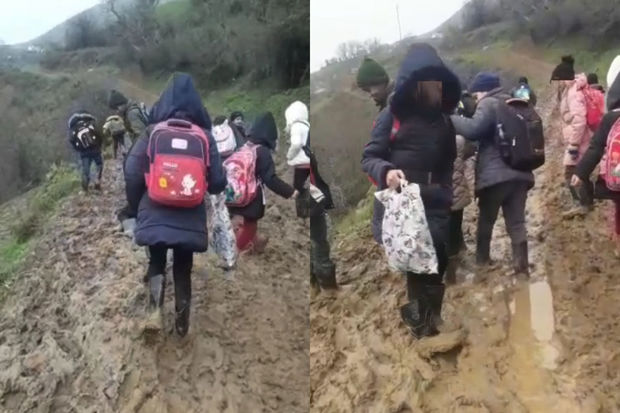 Lənkəranda dizə qədər palçıq olan məktəb yolu