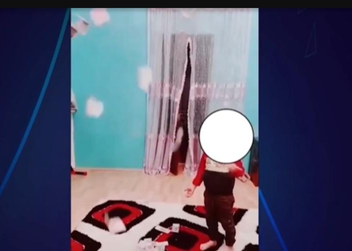 4 yaşlı bacısı oğluna siqaret çəkdirən şəxs polisə ÇAĞIRILDI